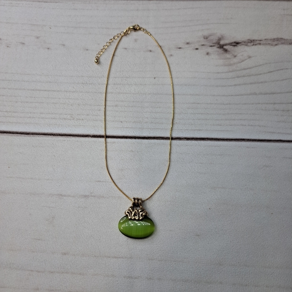 Elegant Gold Tone M Necklace with Green Pendant